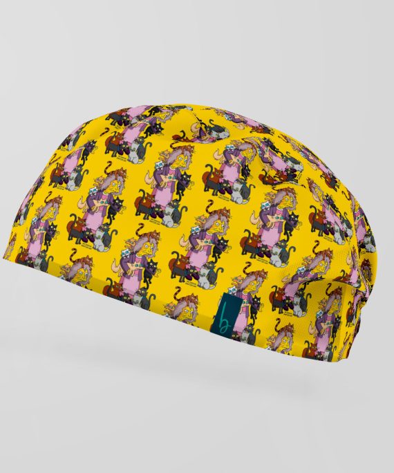 Eleanor Abernathy, la icónica “loca de los gatos” de Los Simpson. Un diseño vibrante y lleno de personalidad, perfecto para amantes de la serie y del humor irreverente. Confeccionado en tela ligera y cómoda, asegura un ajuste perfecto durante toda la jornada. Un toque de color, comicidad y estilo para alegrar cada procedimiento.